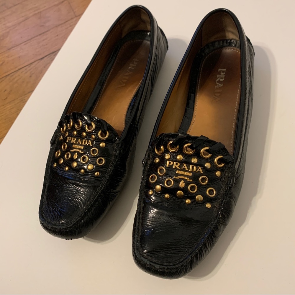 Prada Black Patent Leather & Gold Loafers